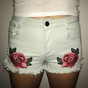 Rose patch floral denim jean shorts mid-rise
